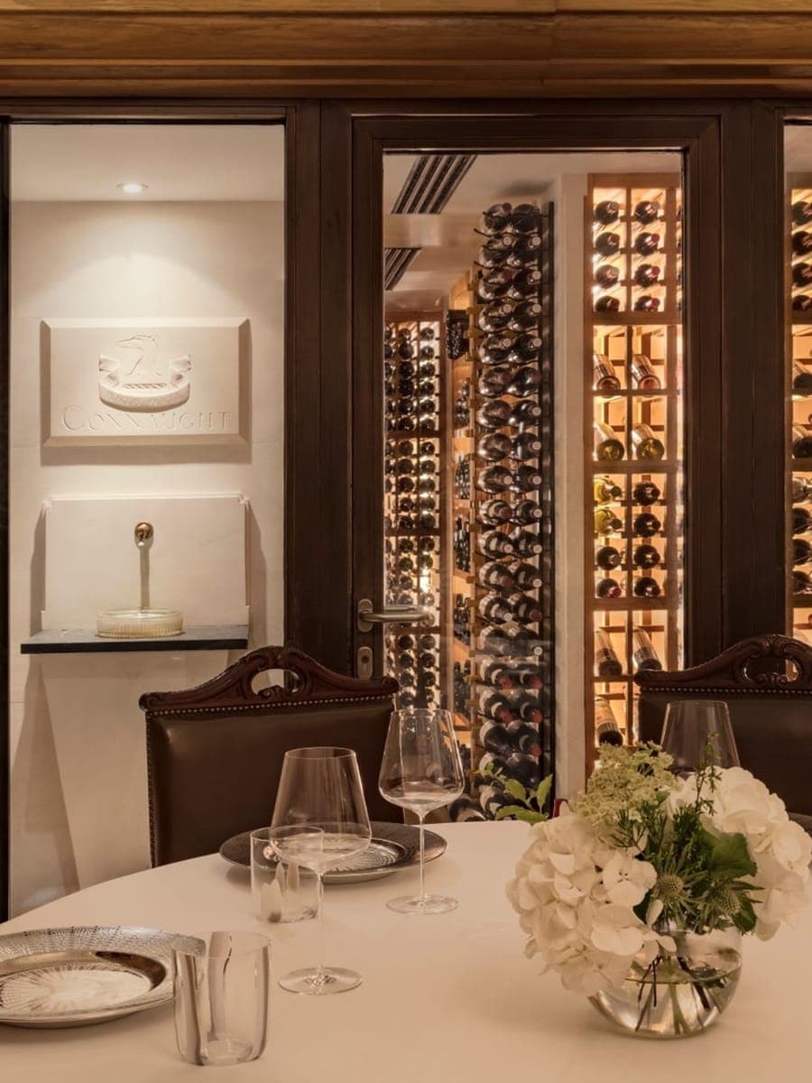 The Sommelier's Table at Hélène Darroze at The Connaught, looking into the wine cellar